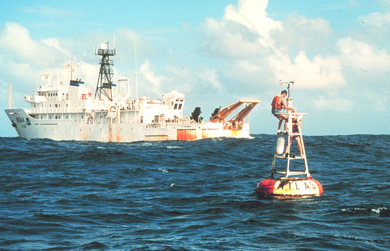 NOAA research vessel Kaimimoana servicing an Atlas buoy in the equatorial Pacific; the buoys monitor ocean conditions associated with El Niño.